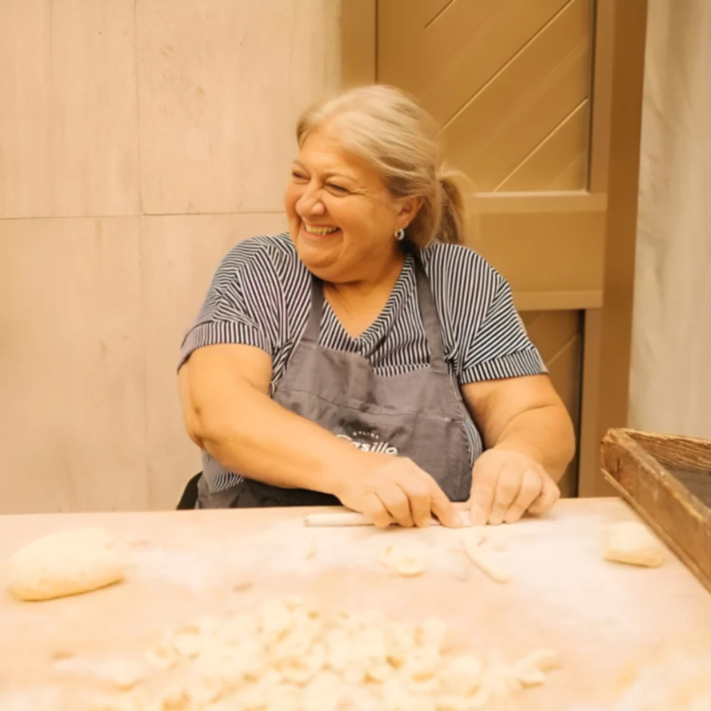 Nunzia La Pastaia making handmade Puglian pasta at Publico Italian Restaurant Singapore